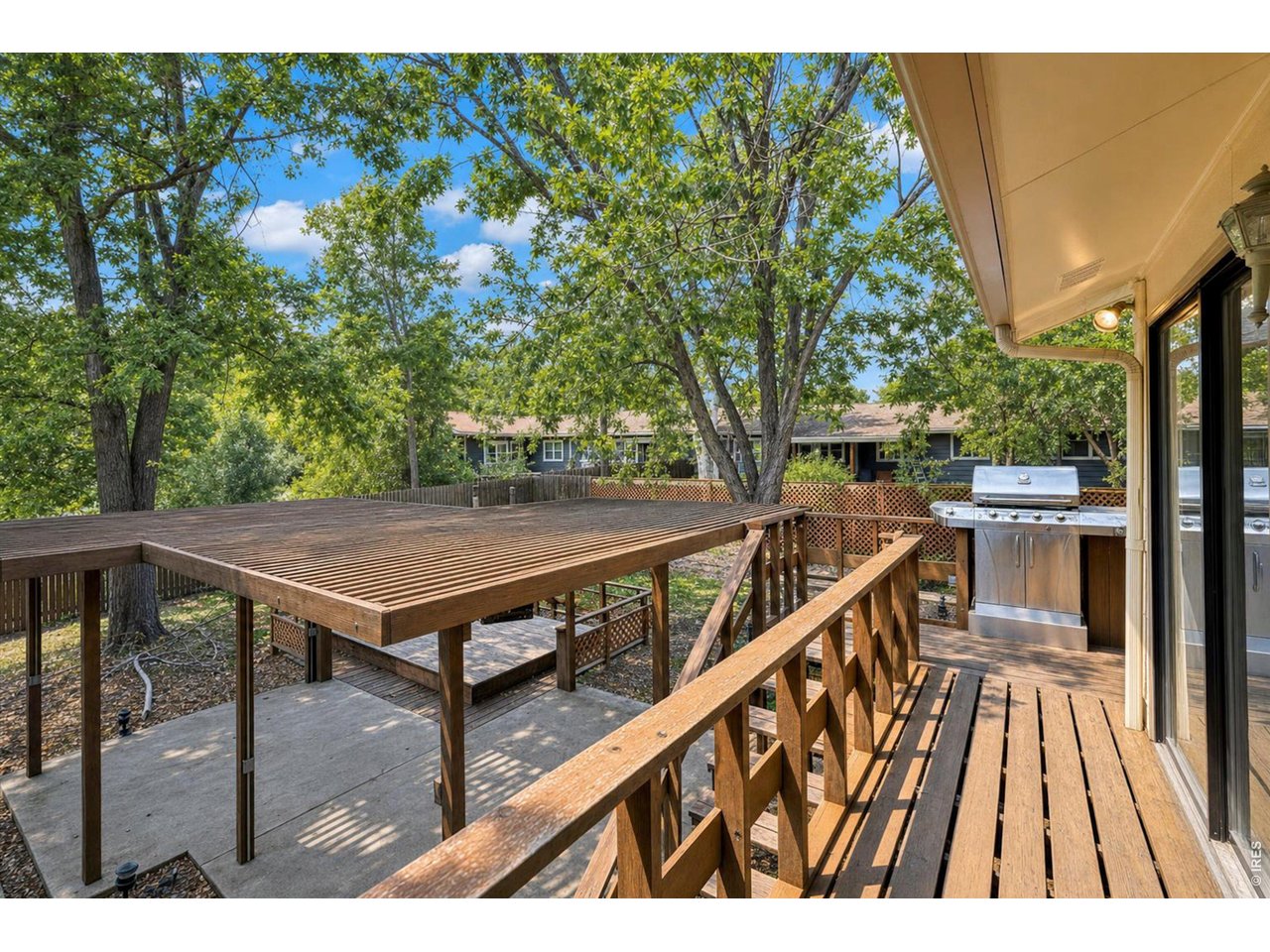 Property Photo 45 Backyard - Wrap-around Deck