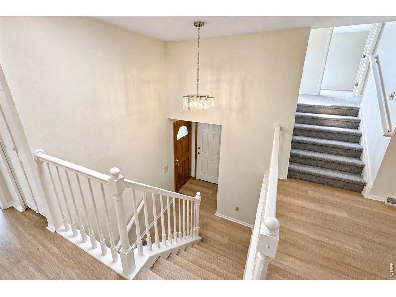 Property Photo 3 Main Level - Foyer Staircase