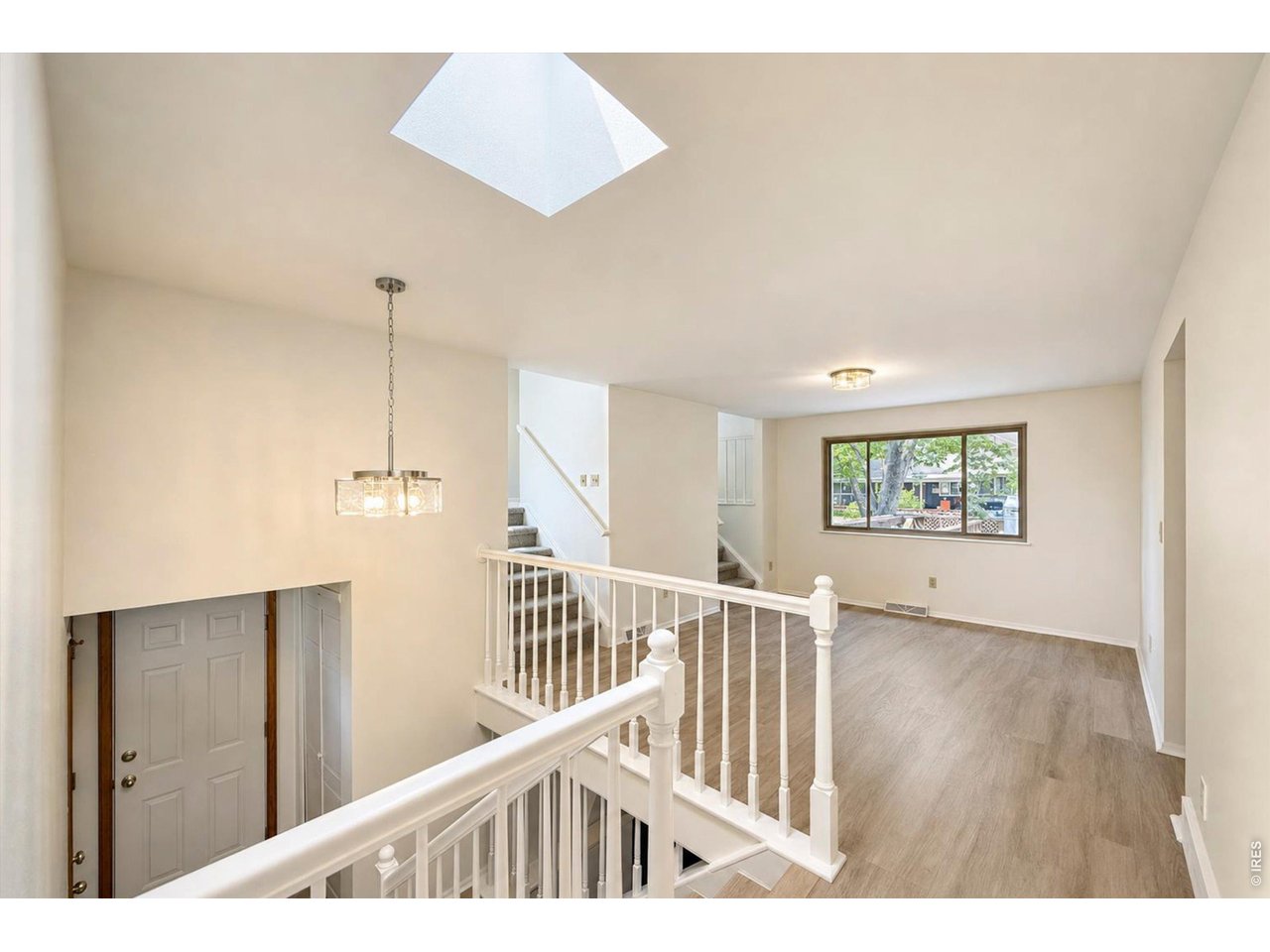 Property Photo 4 Main Level - Foyer to Living Room