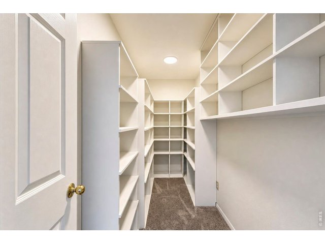 Property Photo 26 Upper Level - Storage Room