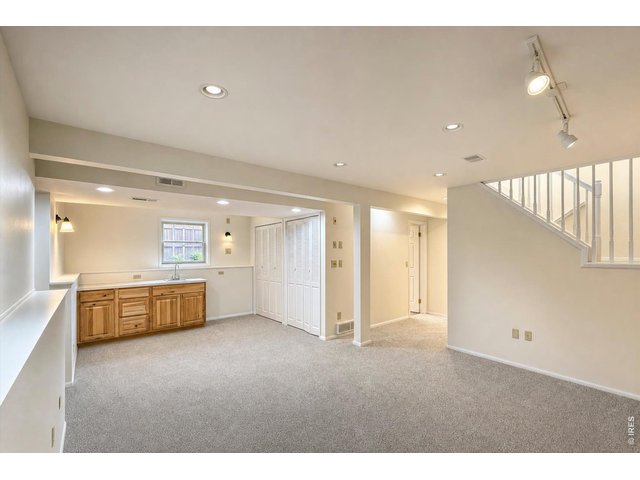 Property Photo 30 Lower Level - Family Room & Wet Bar
