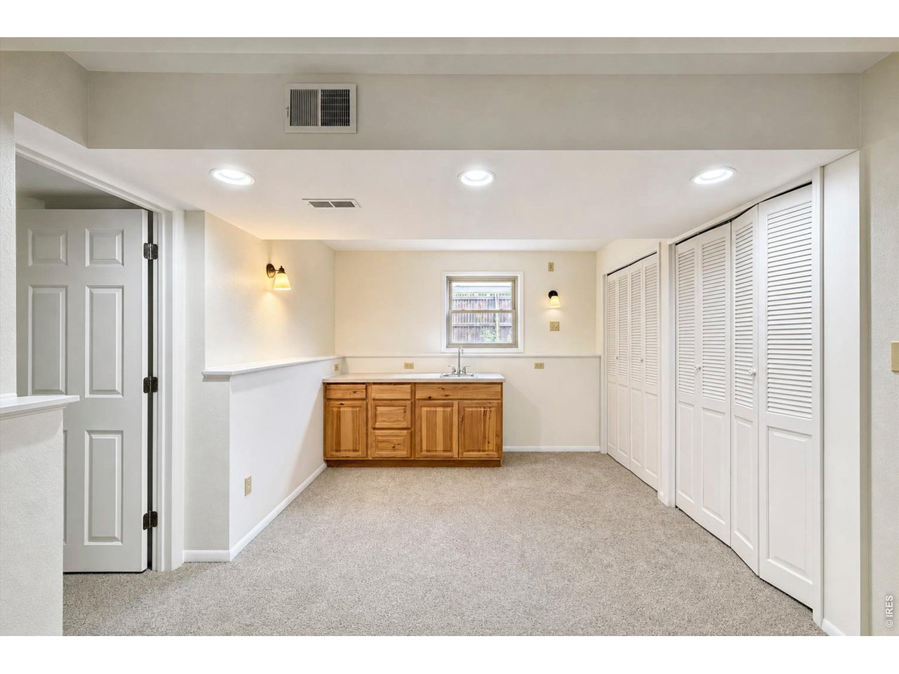 Property Photo 31 Lower Level - Family Room & Wet Bar
