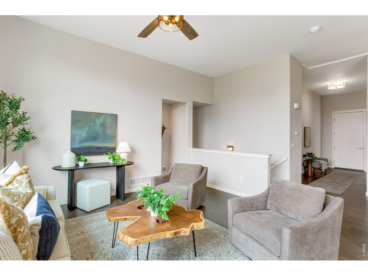 Property Photo 14 Nearly 2,000 finished square feet, warm inviting colors - pretty hand scraped hardwood floors, high ceilings and open concept layout.