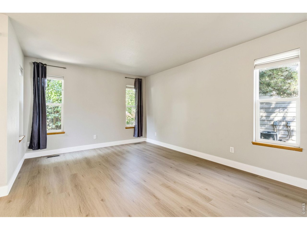 Property Photo 6 Lots of windows bring in natural light