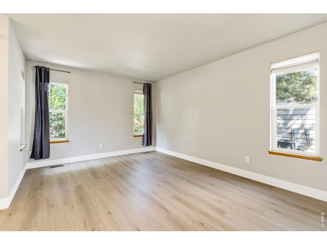 Property Photo 6 Lots of windows bring in natural light