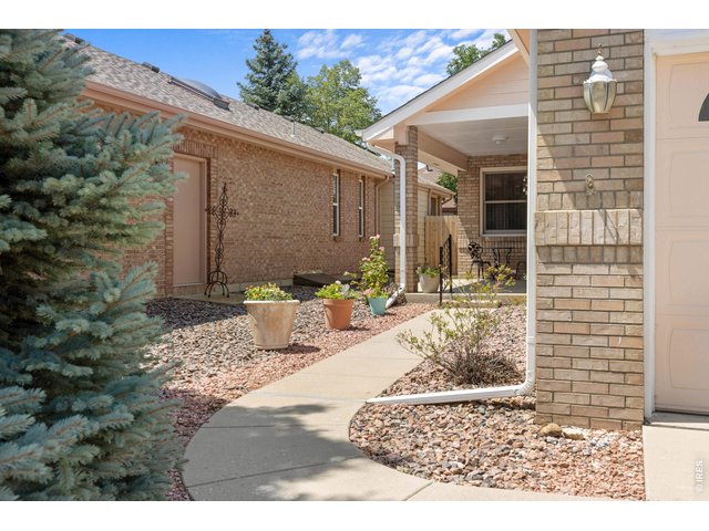 Property Photo 1 Welcome to 809 Zweck. Paved sidewalk to the front porch and entry.