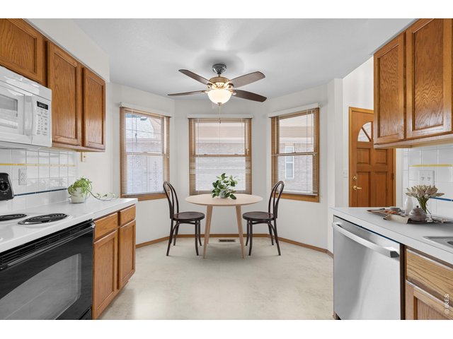 Property Photo 10 Bright breakfast nook in the kitchen. Virtually staged.
