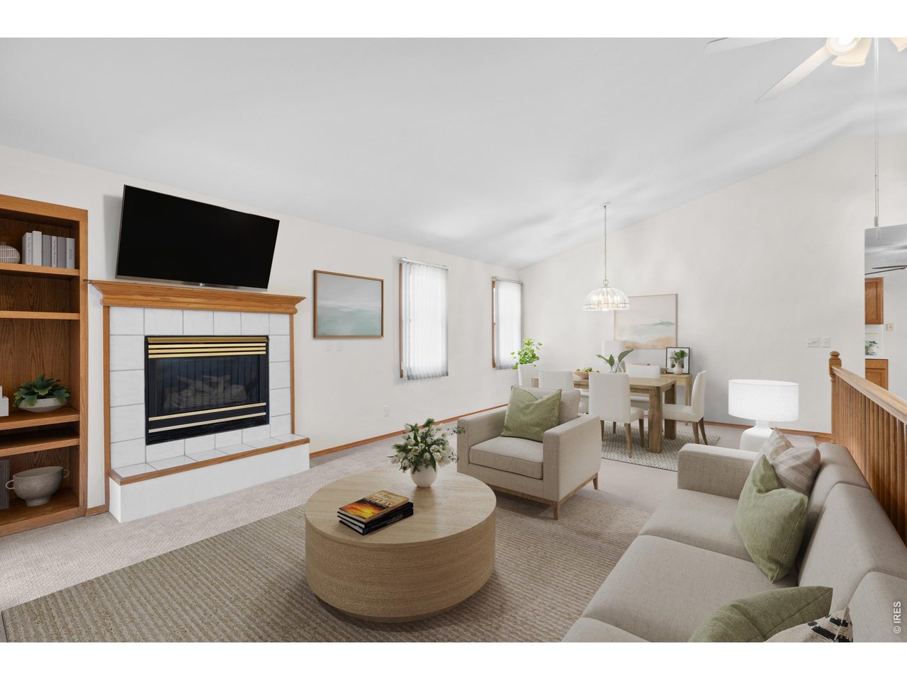 Property Photo 4 Open living dining room with lots of natural light. Virtually staged.