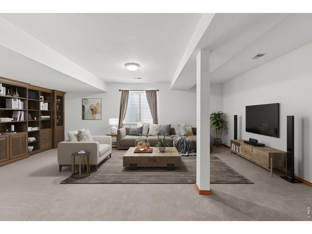 Property Photo 19 Great room in the basement. Lots of space for friends and family. Virtually staged.