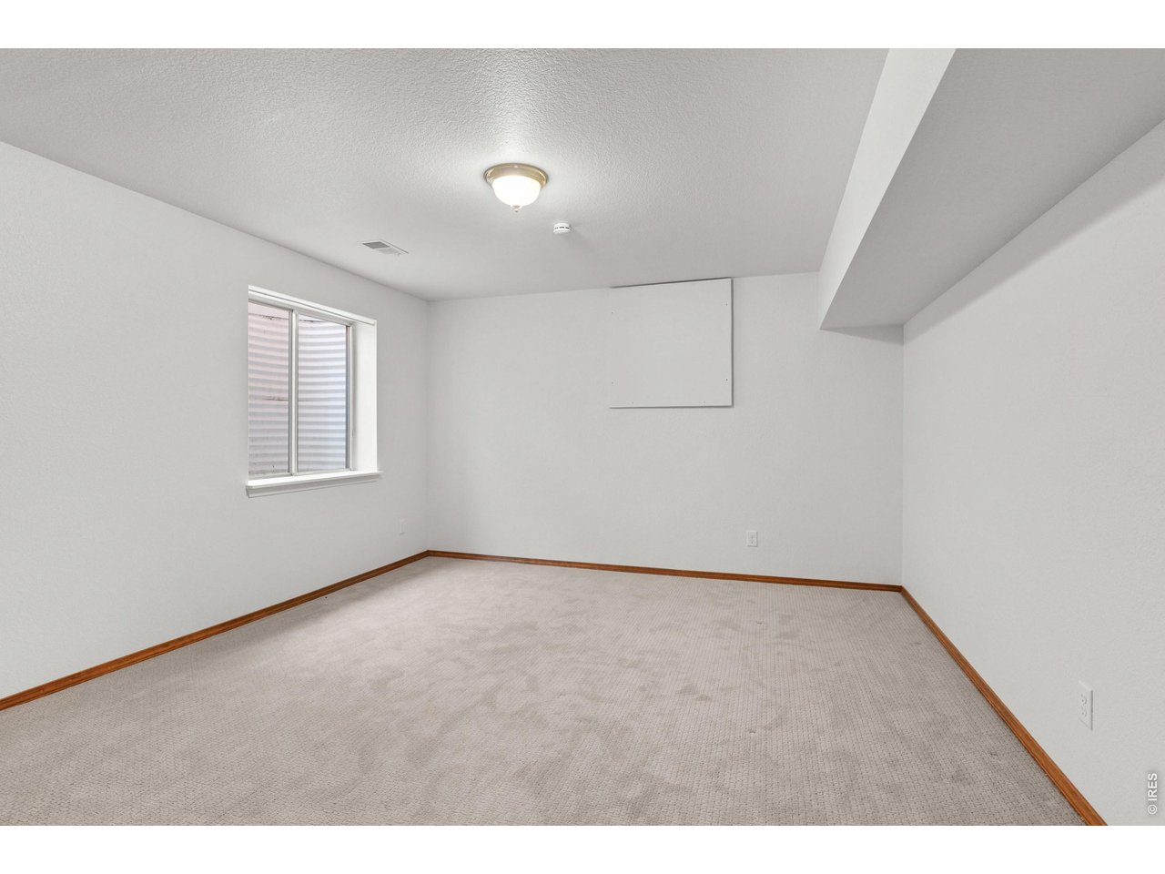 Property Photo 22 Office or Bedroom #3 in basement.