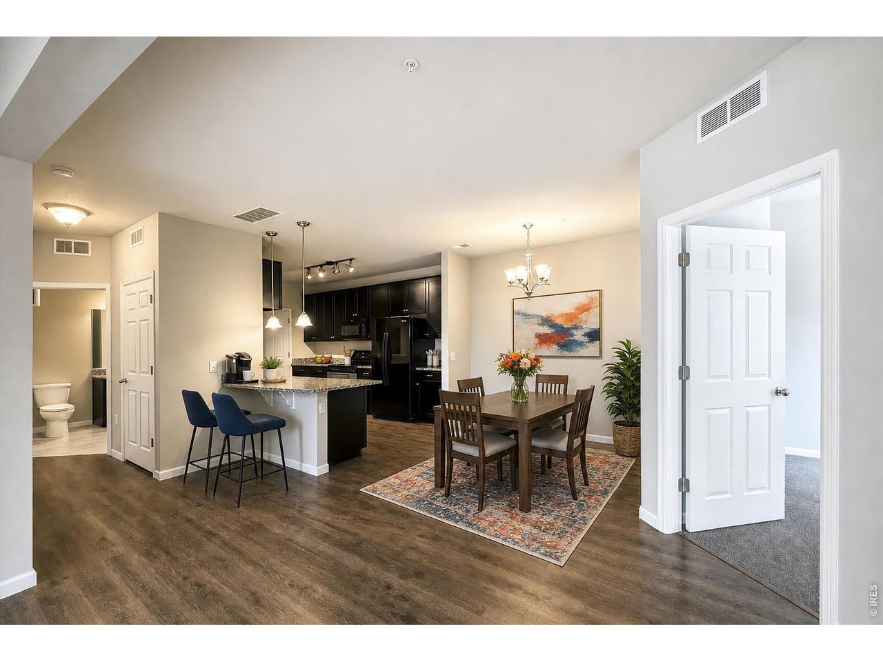 Property Photo 16 Virtually Staged Dining Area & Kitchen