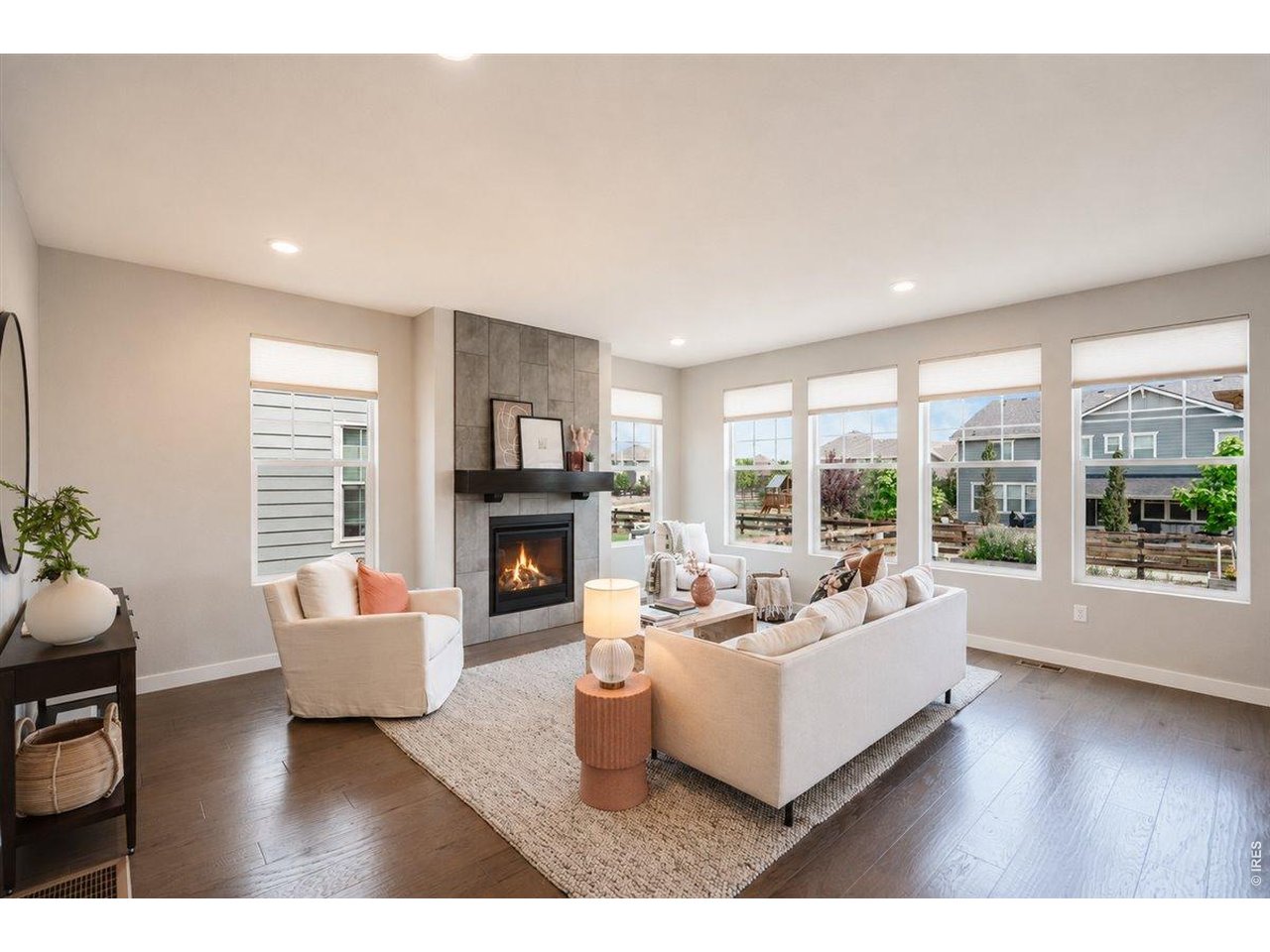Property Photo 8 Large living room with a gas fireplace.