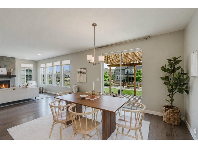 Property Photo 20 The covered patio is just off the dining room, extending your space even further.