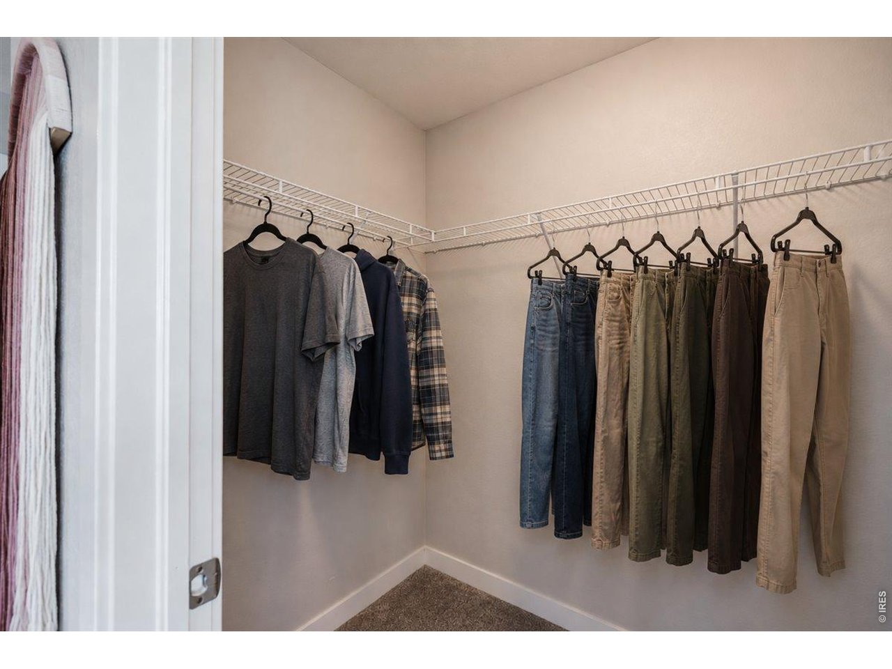 Property Photo 31 Two large, walk-in closets, one in the bedroom. (Virtually staged)