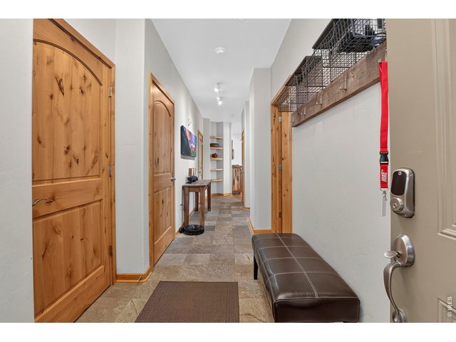 Property Photo 5 Entry Closet Offers Extra Storage for Skies & Bikes