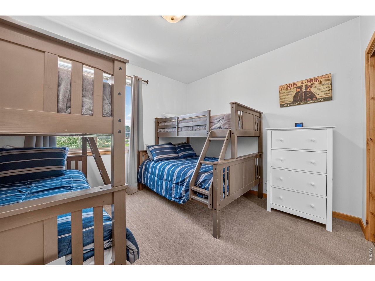 Property Photo 33 Front Bedroom with Two Sets of Bunks