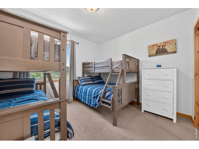 Property Photo 33 Front Bedroom with Two Sets of Bunks
