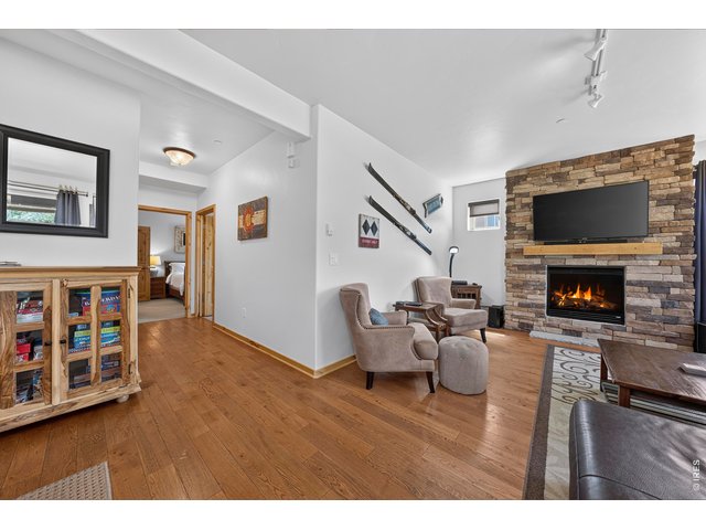 Property Photo 21 Living Room to Back Two Bedrooms & Bathrooms
