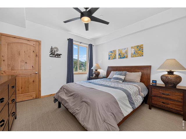 Property Photo 22 Second Bedroom with Queen Bed and Views of the Ski Area