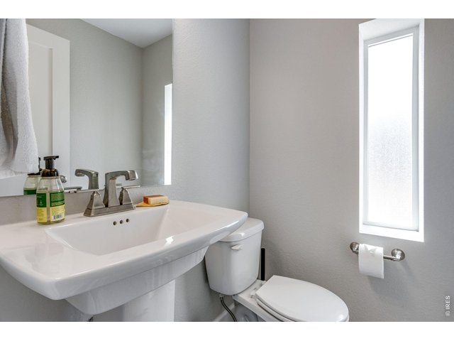 Property Photo 8 Powder Room located at the first Level.