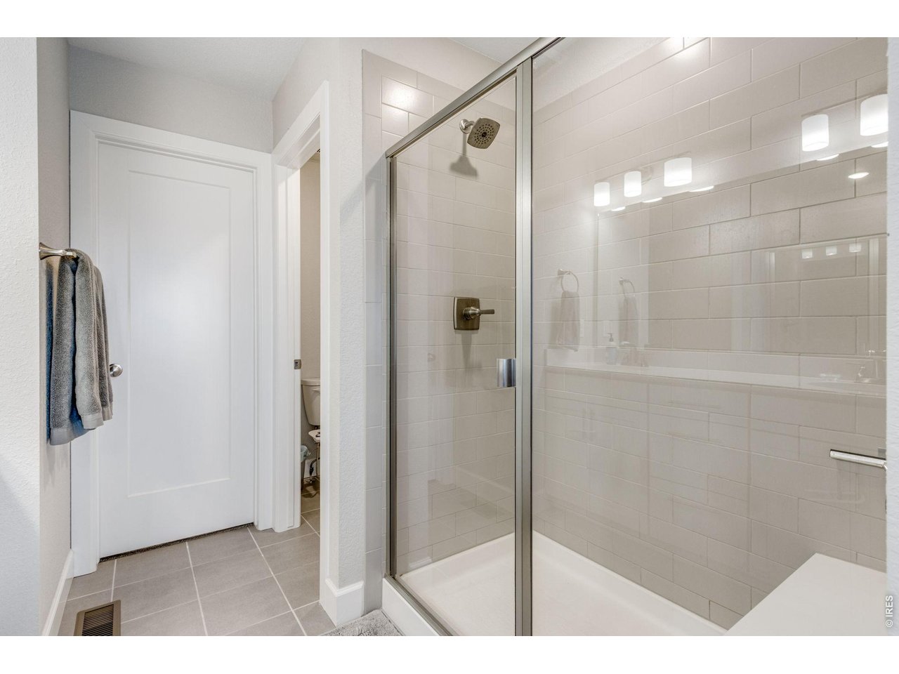 Property Photo 20 Nice-sized glass shower enclosure.
