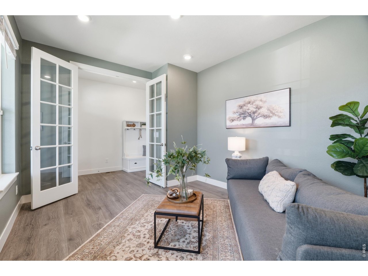 Property Photo 11 A flex space on the main level offers quiet, adaptable square footage office, playroom, or whatever suits your needs.