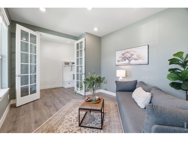 Property Photo 11 A flex space on the main level offers quiet, adaptable square footage office, playroom, or whatever suits your needs.
