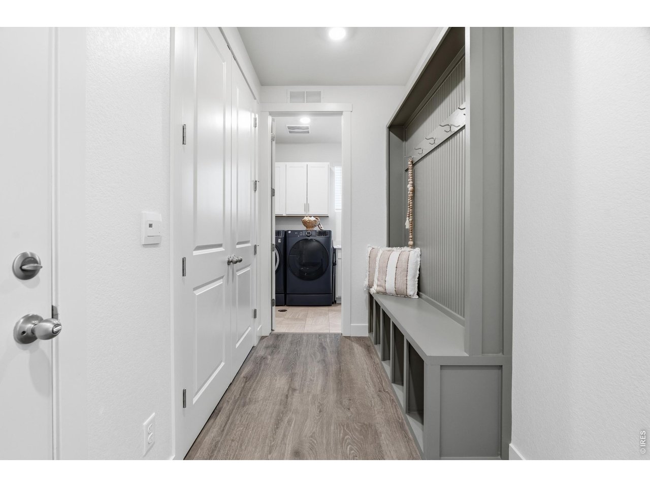 Property Photo 21 Large mudroom with built in storage and ample closet space.