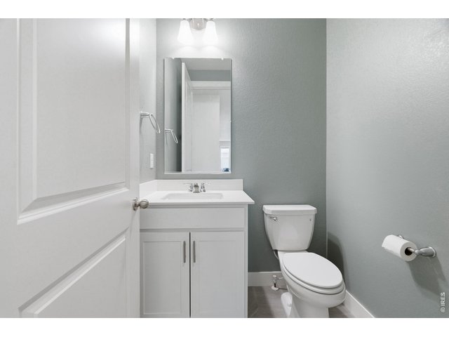 Property Photo 23 Main level powder room.
