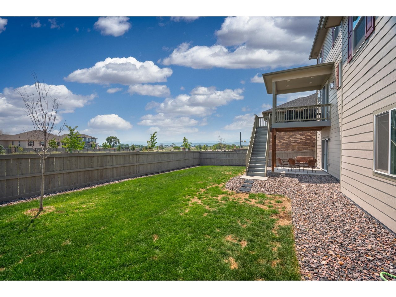 Property Photo 45 Large, private backyard with concrete pad.