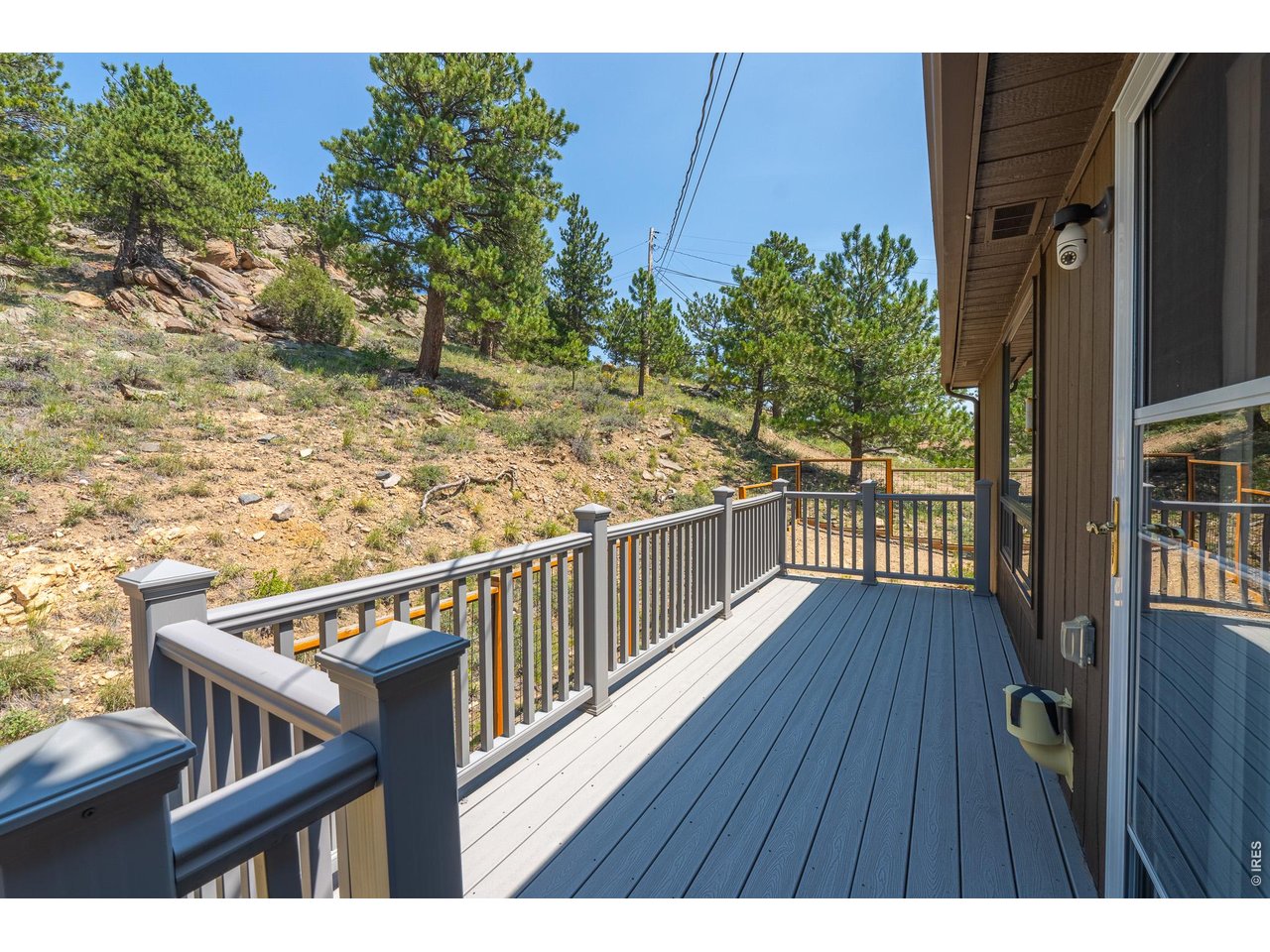 Property Photo 26 Peaceful Back Deck Looking Up the Mountain