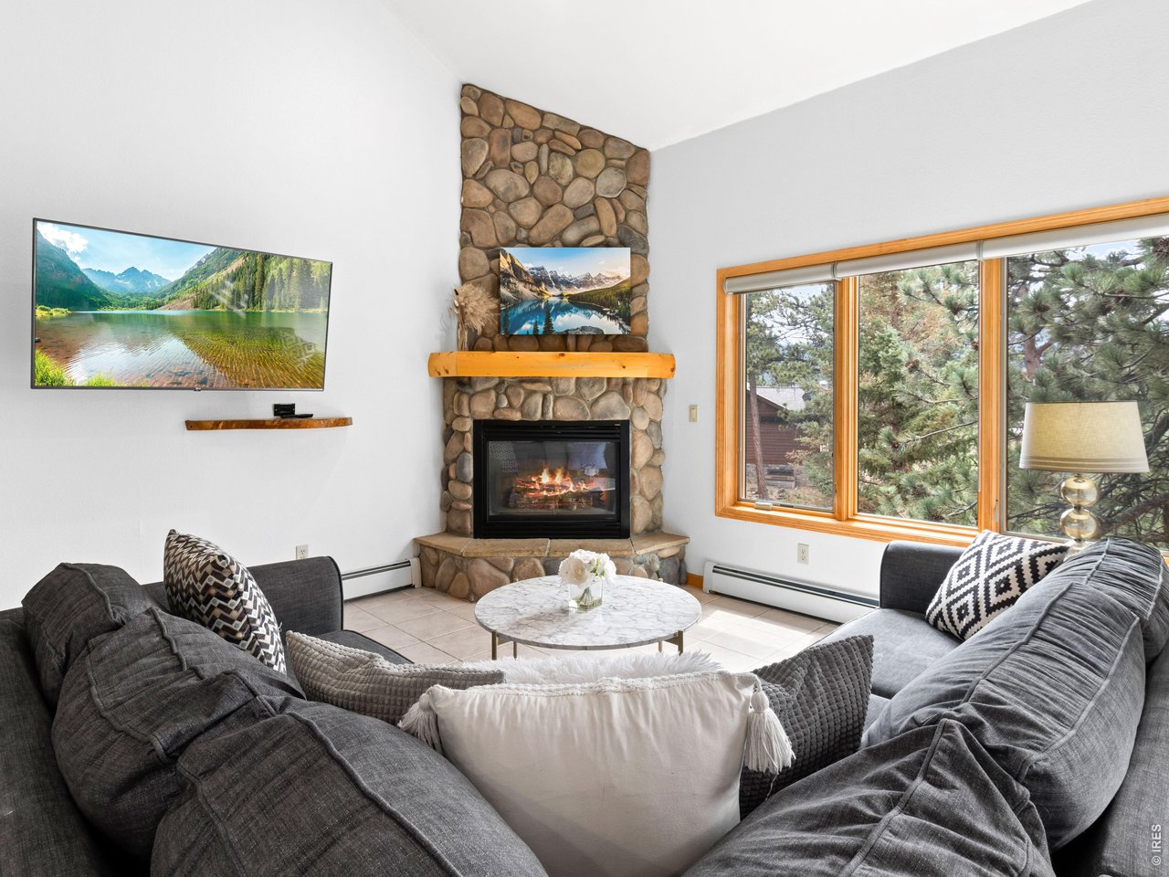 Property Photo 11 Cozy living space with abundant natural light