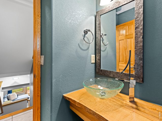 Property Photo 33 Main floor powder room with vessel sink