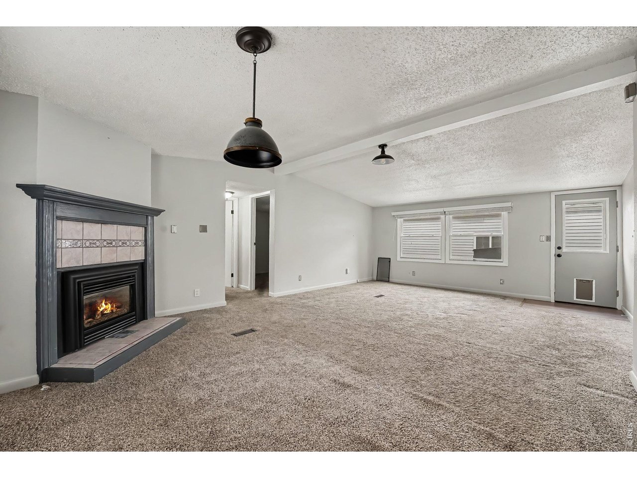 Property Photo 3 Dining room with gas fireplace