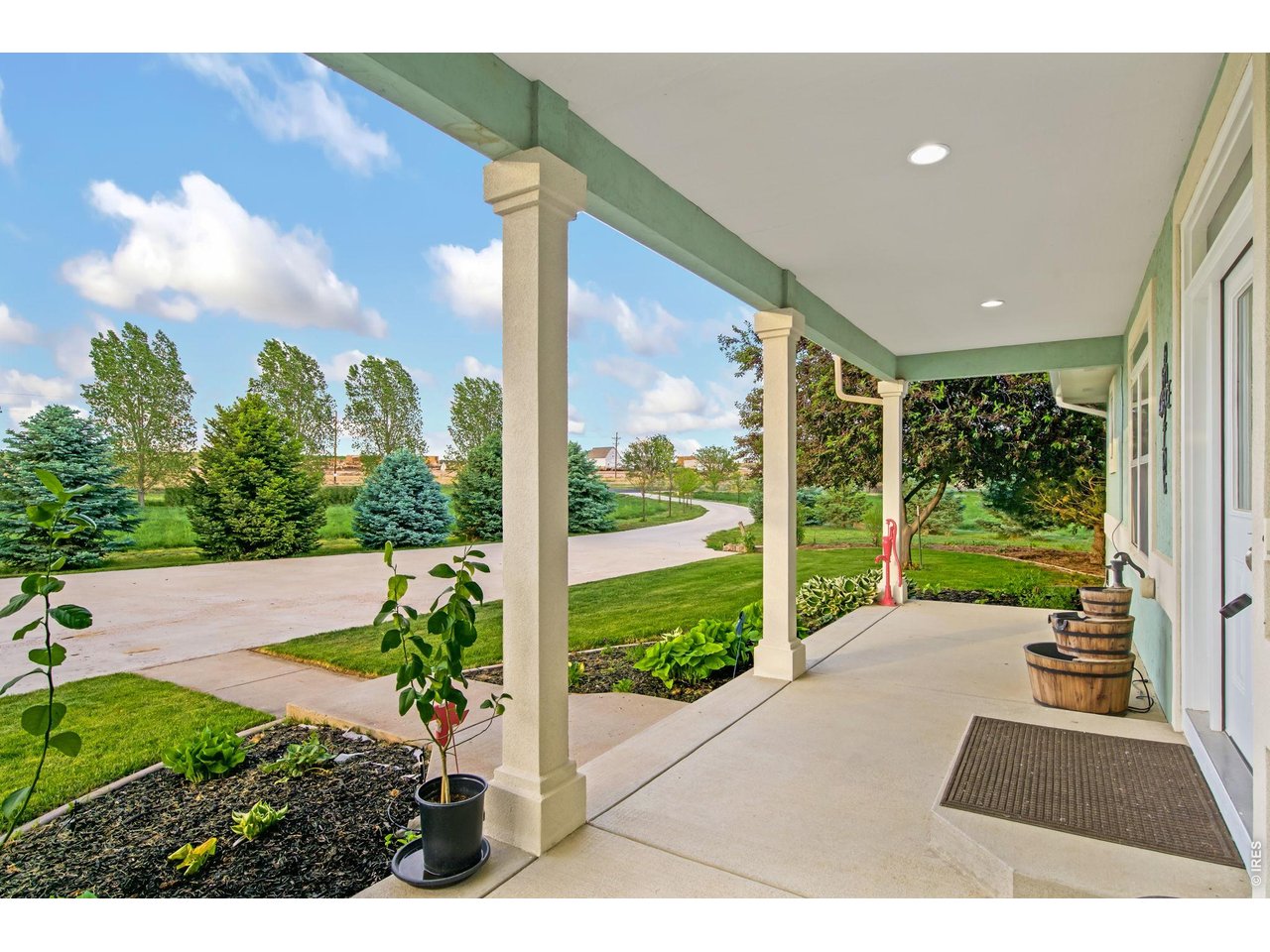 Property Photo 9 North facing covered porch, perfect for your morning coffee.