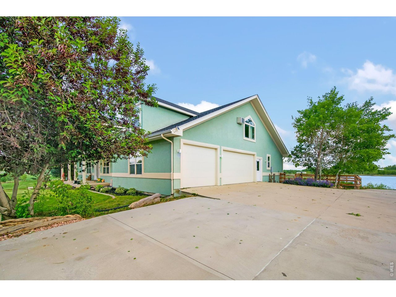 Property Photo 11 Attached 3 car garage for convenient parking.