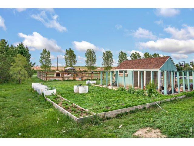 Property Photo 13 Chicken coop and Goat corral.
