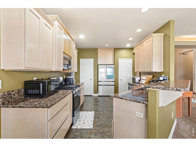 Property Photo 26 Large kitchen with fridge and 2 pantries.