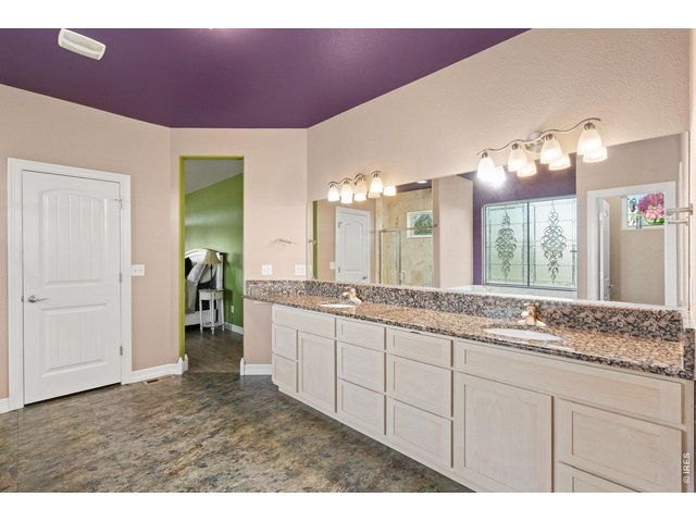 Property Photo 20 HUGE primary bath with dual sinks.