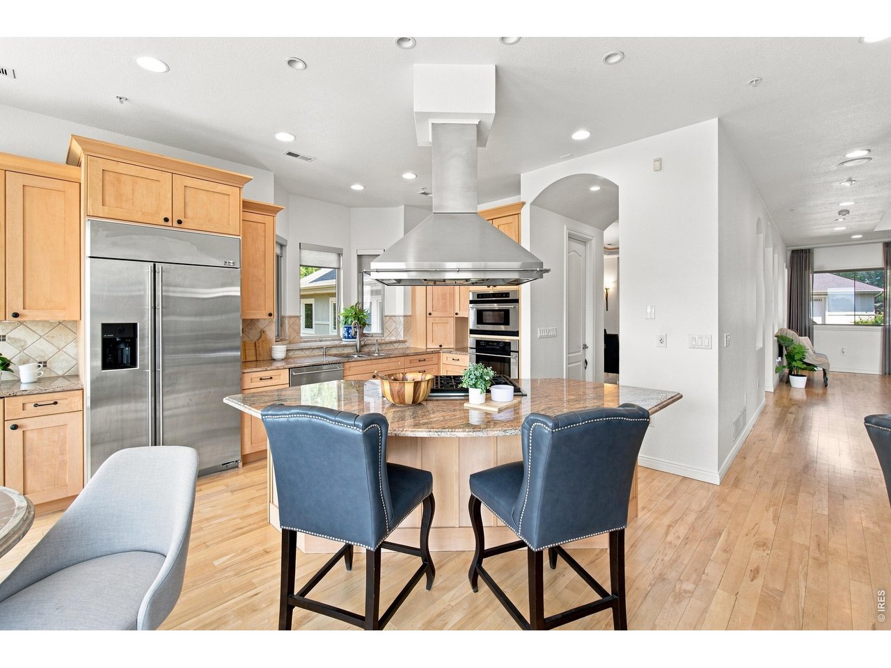 Property Photo 14 Kitchen features abundant cabinetry, granite countertops, stainless appliances and Oven/Microwave
