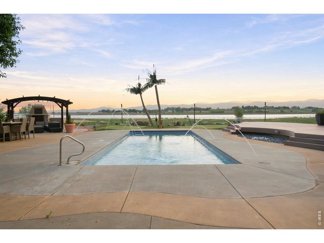 Property Photo 42 Resort-style Saltwater pool with water features overlooking the reservoir and Front Range.