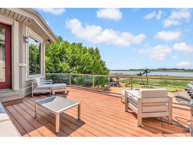 Property Photo 49 Expansive deck captures beautiful reservoir and open-space views an incredible setting for outdoor entertaining.