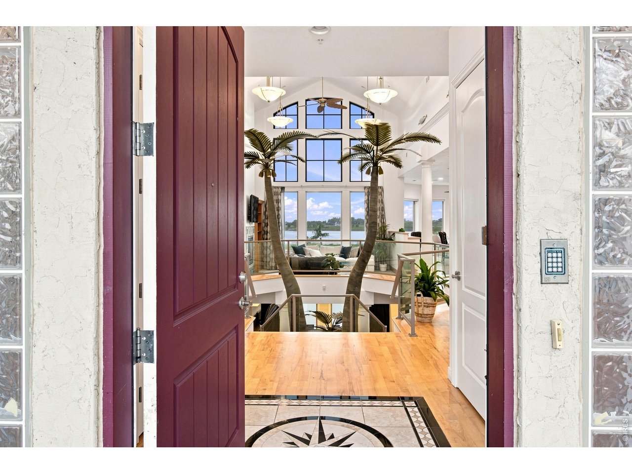 Property Photo 7 Dramatic entry opens to soaring architecture and expansive reservoir views.