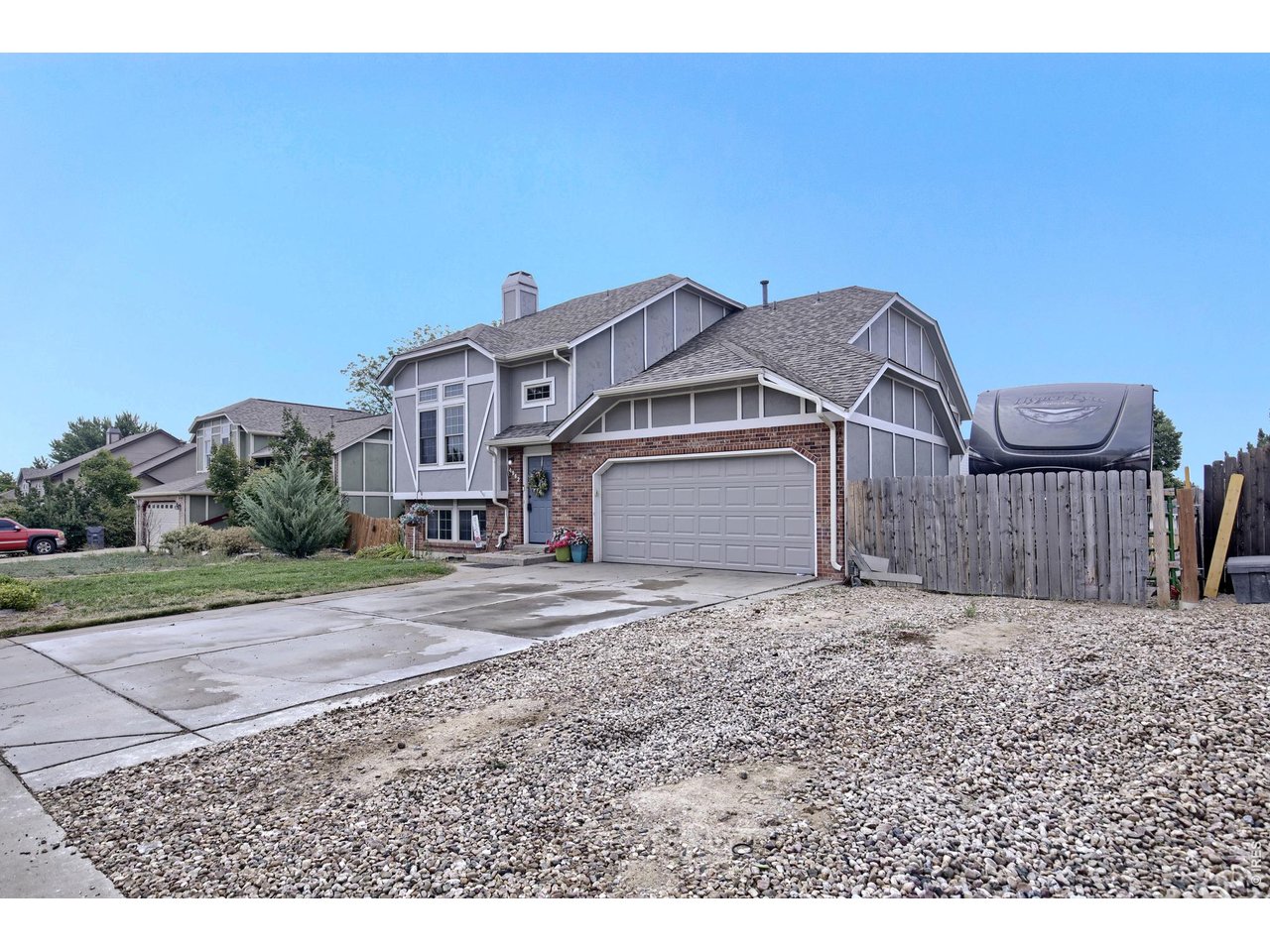 Property Photo 3 Front View with additional parking and RV Parking with 50 Amp Service!!!