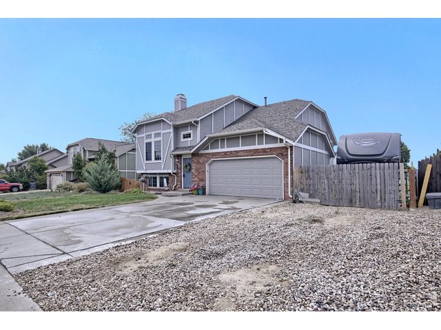 Property Photo 3 Front View with additional parking and RV Parking with 50 Amp Service!!!