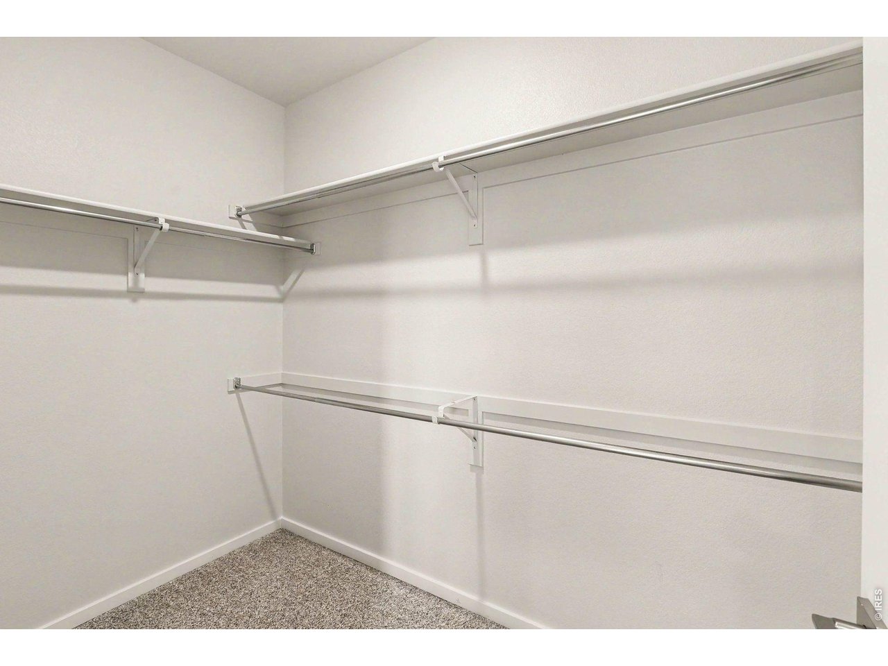 Property Photo 10 Primary walk-in closet