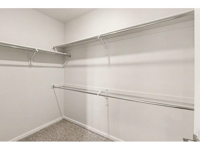 Property Photo 10 Primary walk-in closet