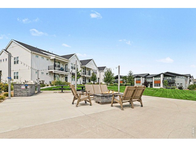 Property Photo 18 Raindance Flats outdoor kitchen, fire pit, and open space
