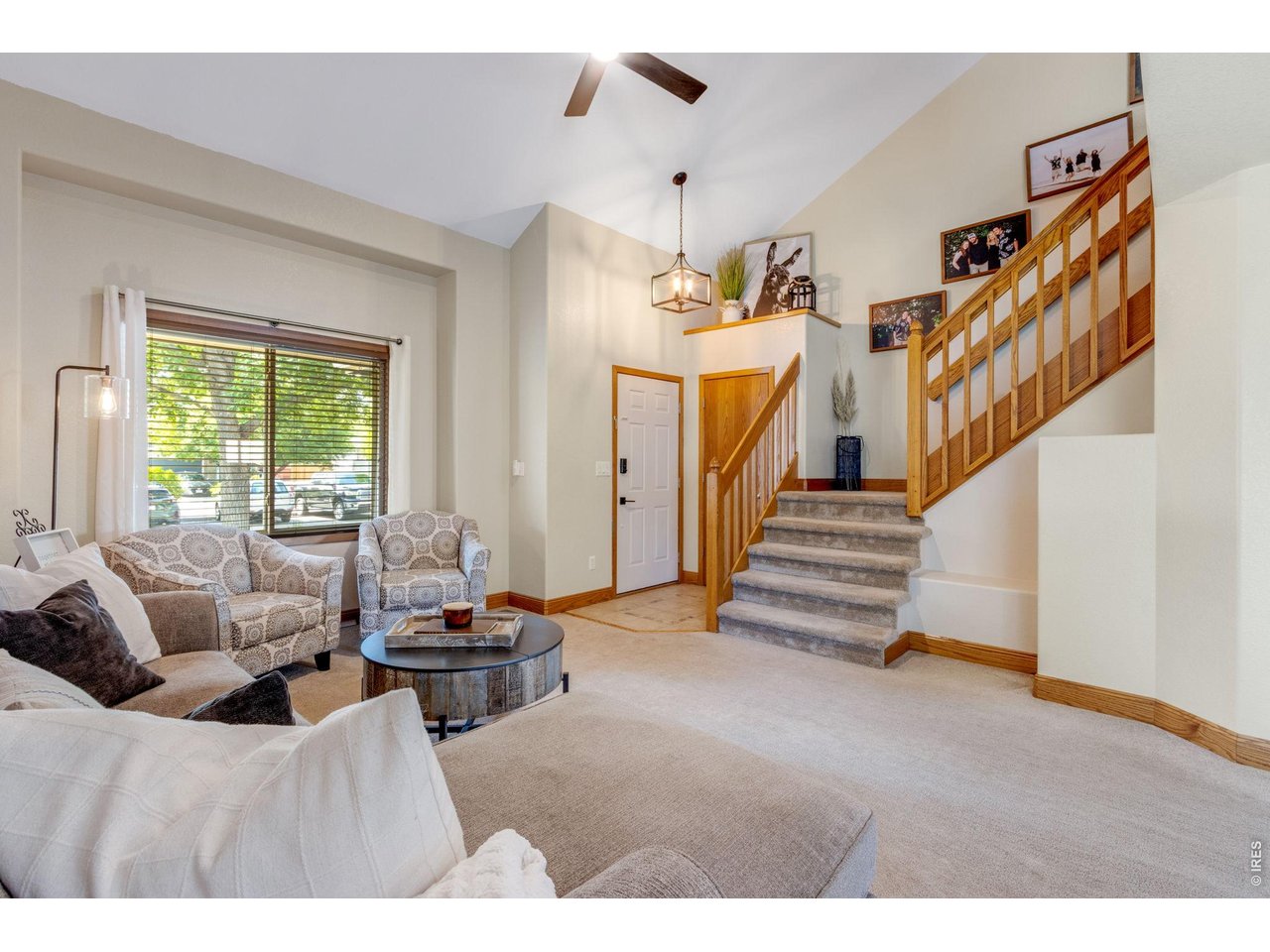 Property Photo 4 Vaulted ceiling and a bright and welcoming atmosphere.