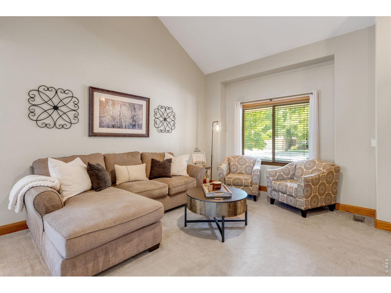 Property Photo 7 Cozy sitting room with solid wood trim throughout.